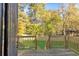 Deck overlooks a fenced backyard with lush green grass at 736 Windsor Sw St, Atlanta, GA 30310