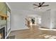 Open concept living room and kitchen area with hardwood floors at 736 Windsor Sw St, Atlanta, GA 30310