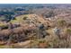 Aerial view of property showing multiple houses and surrounding landscape at 776 Old Lathemtown Road, Canton, GA 30115