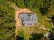 Aerial view of house nestled in a wooded lot at 776 Old Lathemtown Road, Canton, GA 30115