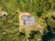 Aerial view of house showing its size and wooded surroundings at 776 Old Lathemtown Road, Canton, GA 30115