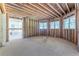 Unfinished basement with bay windows and open layout at 776 Old Lathemtown Road, Canton, GA 30115