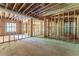 Unfinished basement with framed rooms and open areas at 776 Old Lathemtown Road, Canton, GA 30115