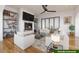 Living room with hardwood floors, fireplace, and built-in shelving at 776 Old Lathemtown Road, Canton, GA 30115