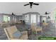 Spacious stone porch with ceiling fans and comfortable seating at 776 Old Lathemtown Road, Canton, GA 30115