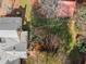 Aerial view of the home's backyard and a detached structure at 7865 Nesbit Ferry Rd, Sandy Springs, GA 30350