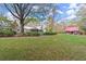 Expansive backyard with a separate outbuilding at 7865 Nesbit Ferry Rd, Sandy Springs, GA 30350