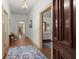 Hallway with hardwood floors and access to other rooms at 7865 Nesbit Ferry Rd, Sandy Springs, GA 30350