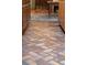 Herringbone brick flooring in the kitchen at 7865 Nesbit Ferry Rd, Sandy Springs, GA 30350
