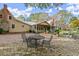 Brick patio with seating area and view of the house at 7865 Nesbit Ferry Rd, Sandy Springs, GA 30350