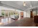 Sunroom with large windows offering views of the backyard and surrounding greenery at 7865 Nesbit Ferry Rd, Sandy Springs, GA 30350