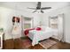 Cozy bedroom with white walls, wood floors, and a hanging chair at 8451 Duncan St, Douglasville, GA 30134