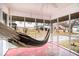 Cozy sunroom with hammock, perfect for relaxation at 8451 Duncan St, Douglasville, GA 30134
