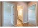 Hallway leading to bedrooms and a bathroom at 7640 Homer Dr, Cumming, GA 30028