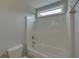 Simple bathroom with shower/tub combo at 1721 Cobblefield Cir, Dacula, GA 30019
