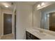 Bathroom with single vanity and mirror at 1721 Cobblefield Cir, Dacula, GA 30019