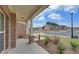 Covered front porch with stone columns overlooking a quiet neighborhood at 1721 Cobblefield Cir, Dacula, GA 30019