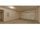 Spacious garage with overhead storage and an automatic door opener at 1721 Cobblefield Cir, Dacula, GA 30019