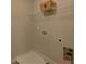 Laundry room with shelving and space for washer/dryer at 1721 Cobblefield Cir, Dacula, GA 30019