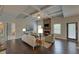 Open concept living room with a fireplace and access to back deck at 1721 Cobblefield Cir, Dacula, GA 30019