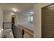 Spacious loft area with neutral carpeting and a railing at 1721 Cobblefield Cir, Dacula, GA 30019