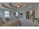 Spacious main bedroom with carpeted floor, large windows, and sitting area at 1721 Cobblefield Cir, Dacula, GA 30019