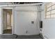 Unfinished laundry room with wire shelving and washer/dryer hookups at 633 Larchmont Nw Cir, Atlanta, GA 30318