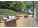 Relaxing deck with outdoor seating and string lights at 1900 Harper Nw Rd, Atlanta, GA 30318
