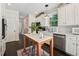 White kitchen with stainless steel appliances and a kitchen island at 1900 Harper Nw Rd, Atlanta, GA 30318