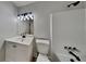 Updated bathroom with white vanity and shower/tub combo at 5768 Albans Cir, Lithonia, GA 30058