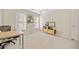 Home office with desk, chair, and built-in shelving at 1532 Oak Grove Rd, Decatur, GA 30033