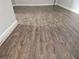 Empty bedroom with dark hardwood floors and neutral walls at 3817 Raiders Ridge Dr, Lithonia, GA 30038