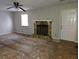 Living room with stone fireplace and ceiling fan at 3817 Raiders Ridge Dr, Lithonia, GA 30038