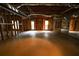 Large unfinished basement space with framing and some windows at 1378 Wesley Oaks Nw Ct, Atlanta, GA 30327