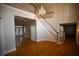 Grand foyer with hardwood floors, curved staircase, and crystal chandelier at 1378 Wesley Oaks Nw Ct, Atlanta, GA 30327