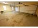 Two-car garage with storage space and overhead door opener at 1378 Wesley Oaks Nw Ct, Atlanta, GA 30327