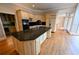 Kitchen featuring a large island with granite countertops, stainless steel appliances, and ample counter space at 1378 Wesley Oaks Nw Ct, Atlanta, GA 30327