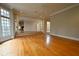 Bright living room with hardwood floors, a ceiling fan, and recessed lighting at 1378 Wesley Oaks Nw Ct, Atlanta, GA 30327