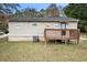 Rear view of house with deck and yard at 2625 Abner Nw, Atlanta, GA 30318