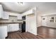 Modern kitchen with white cabinets, granite counters, and stainless steel appliances at 2625 Abner Nw, Atlanta, GA 30318