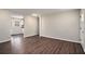 Spacious living area featuring dark hardwood floors and neutral walls at 2625 Abner Nw, Atlanta, GA 30318