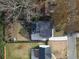 Aerial view of a home's backyard with a patio, deck, and fenced yard at 2167 Montrose Ave, Atlanta, GA 30311