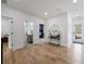 Bright hallway with hardwood floors leading to various rooms at 2167 Montrose Ave, Atlanta, GA 30311