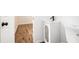 Clean, modern bathroom with white vanity, toilet, and hardwood floors at 6709 Londonderry Dr, Morrow, GA 30260