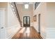 Two-story foyer with hardwood floors and elegant staircase at 1472 Lachona Ct, Atlanta, GA 30329