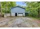 Ranch home with attached garage and deck in wooded setting at 4985 Watkins Ct, Winston, GA 30187