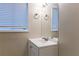 Clean bathroom with vanity, mirror, and window at 2761 Whisper Ct, Douglasville, GA 30135