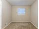 Cozy bedroom with a window and neutral wall at 2761 Whisper Ct, Douglasville, GA 30135