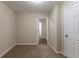 Simple bedroom with access to a hallway and bath at 2761 Whisper Ct, Douglasville, GA 30135