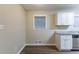 Simple dining area with neutral walls and wood flooring at 2761 Whisper Ct, Douglasville, GA 30135